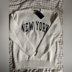 Brandy Melville Cream 'New York' Knit Sweater